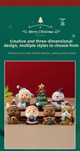 Close-up of cute resin Christmas figurines featuring Santa, reindeer and mini trees