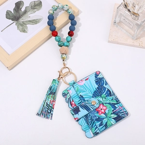 Tropical leaf PU leather card holder keychain with colorful wooden beads and tassel