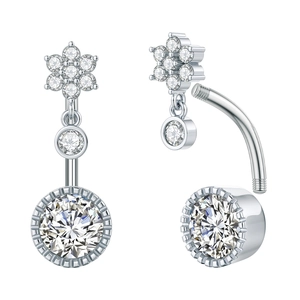 Detail view of silver zircon belly ring showing floral design and threaded screw assembly