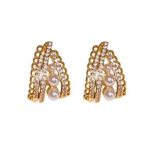 French retro gold earrings with hollow frame, white pearls and sparkling zircons