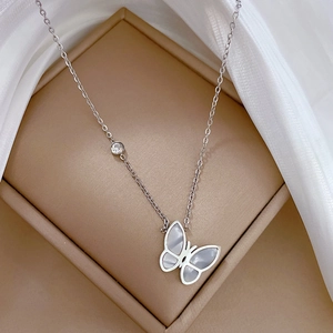 Elegant silver titanium butterfly necklace with mother-of-pearl shell in a luxury gift box