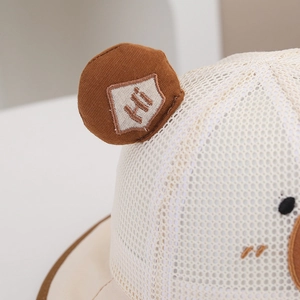 Close-up of breathable mesh baby sun hat with cute bear ears and Hi embroidery