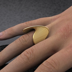18k gold plated stainless steel twisted ring with textured stripe design on finger