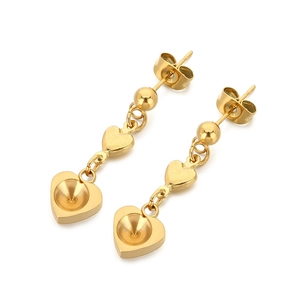 Golden stainless steel heart tassel earrings with polished finish on white background