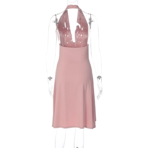 Front detail of pink halter neck slim fit dress with deep V-neck and cinched waist