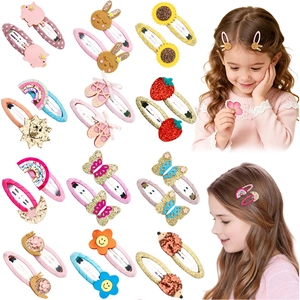 Detail of colorful children's hair clips featuring sequins and cartoon animal designs