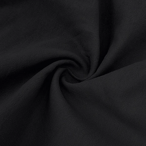 Macro shot of black linen texture and woven fabric structure on men's polo shirt