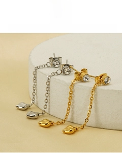 Detail of 18K gold plated heart tassel earrings with clear crystal studs and long chains