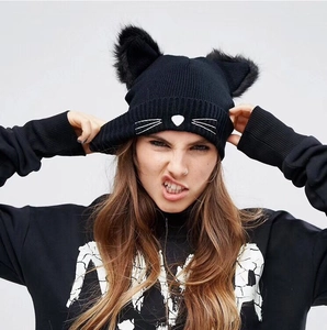 Cute black knit beanie with cat ears and white whiskers embroidery for winter fashion