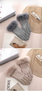 Detail of gray and tan knitted winter gloves with plush faux fur cuffs and thermal lining
