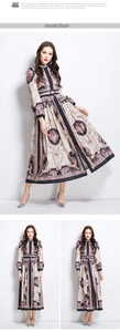 Detail of vintage baroque floral print on ivory long-sleeve dress with stand collar