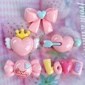 Pink heart and bow resin charms featuring Candy and LOVE text on strawberry background