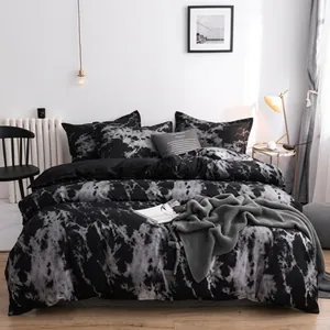 Detail of dark marble texture bedding set including pillowcase and fitted sheet fabric