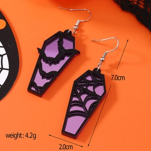 Detail view of purple and black acrylic coffin earrings with bat and spider web patterns