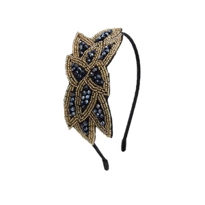 Elegantes handgefertigtes Stirnband mit filigranen Goldperlen und dunkelblauen Kristallen