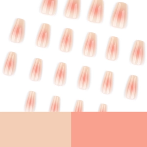 Pink blush gradient press-on nails with minimalist French nude design in trapezoid shape