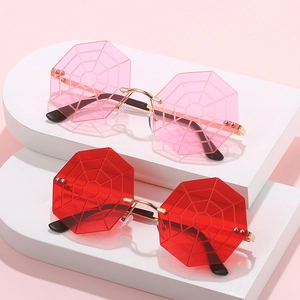 Unique rimless spider web sunglasses with pink and red lenses on metal frames