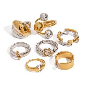 Set di anelli bicolore in acciaio inossidabile con design geometrici e a catena