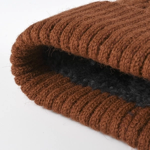 Thick brown knit beanie with warm black fleece lining for outdoor winter insulation