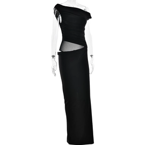 Detail of ruched black one-shoulder evening dress featuring side mesh cutout and floor length