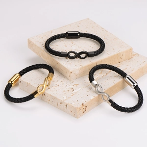 Infinity leather wrap bracelet with magnetic clasp in black, gold, and silver finishes