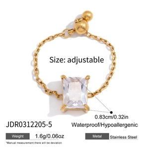 Detail of adjustable gold-tone stainless steel chain ring with a rectangular zircon stone