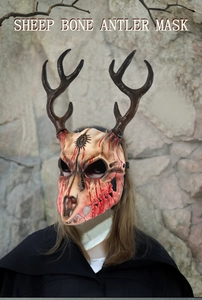 Close-up of a sheep bone antler mask featuring realistic blood splatters for Halloween