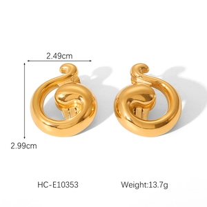 Detail of gold swirl earrings with measurements 2.99cm by 2.49cm and product specs