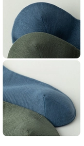 Macro view of the reinforced toe construction on cotton low-cut invisible socks