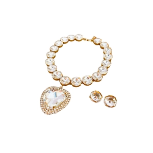 Luxury gold necklace set with heart shaped crystal pendant and matching round earrings