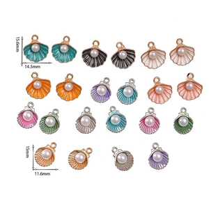 Detailed macro view of colorful pearl shell alloy charms with size measurements