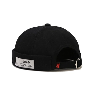Classic black canvas Miki Hat with letter label and adjustable metal buckle strap