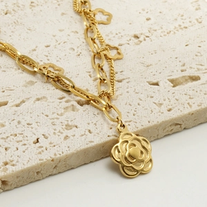 Golden flower pendant bracelet with camellia charms on stainless steel double chain