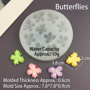 Détail du moule silicone papillon montrant capacité 10g et dimensions de 1,8x2,2cm