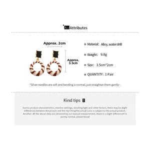 Detail view of geometric drop earrings with dimensions and material specifications