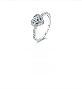 Macro shot of S925 sterling silver ring with heart moissanite and pave diamonds