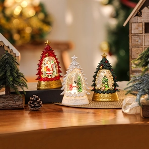Lighted Christmas tree lanterns with Santa and snowman scenes in red white and green