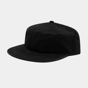 Detail shot of black cotton twill cadet cap showing clean stitching and top button texture