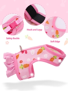 Detail of pet harness showing safety buckle, hook and loop, and soft edges for small animals
