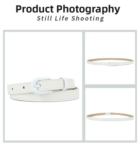 Detail view of white minimalist faux leather belt with a matching matte D-ring buckle