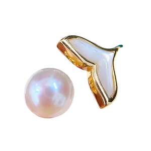 Elegant gold fish tail ring with natural round pearl and white mother-of-pearl inlay