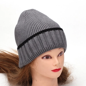 Classic grey ribbed knit beanie with black stripe detail for winter warmth