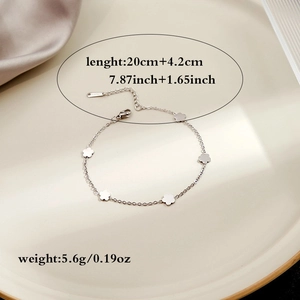 Detailed size view of silver bracelet with small flower charms and lobster clasp