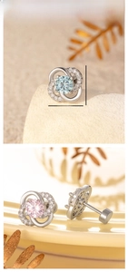 Detailed close-up of lucky clover ear stud with zircon inlay and flat screw back