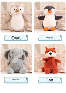 Detailed close-up of owl, penguin, elephant and fox plush toys in woven baskets