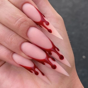 Halloween blood drip stiletto fake nails with nude base and glossy 3D red lava design