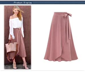 Detail of dusty pink wrap midi skirt featuring high waist self-tie bow and A-line split