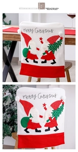 Detail of Christmas chair cover featuring Santa Claus embroidery and Merry Christmas text