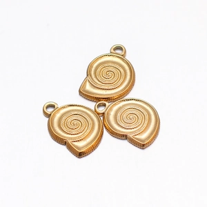 Macro shot of three 18K gold-plated stainless steel conch shell pendants with top loops