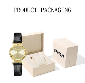 Elegant gold women watch with leather strap and luxury gift box packaging display